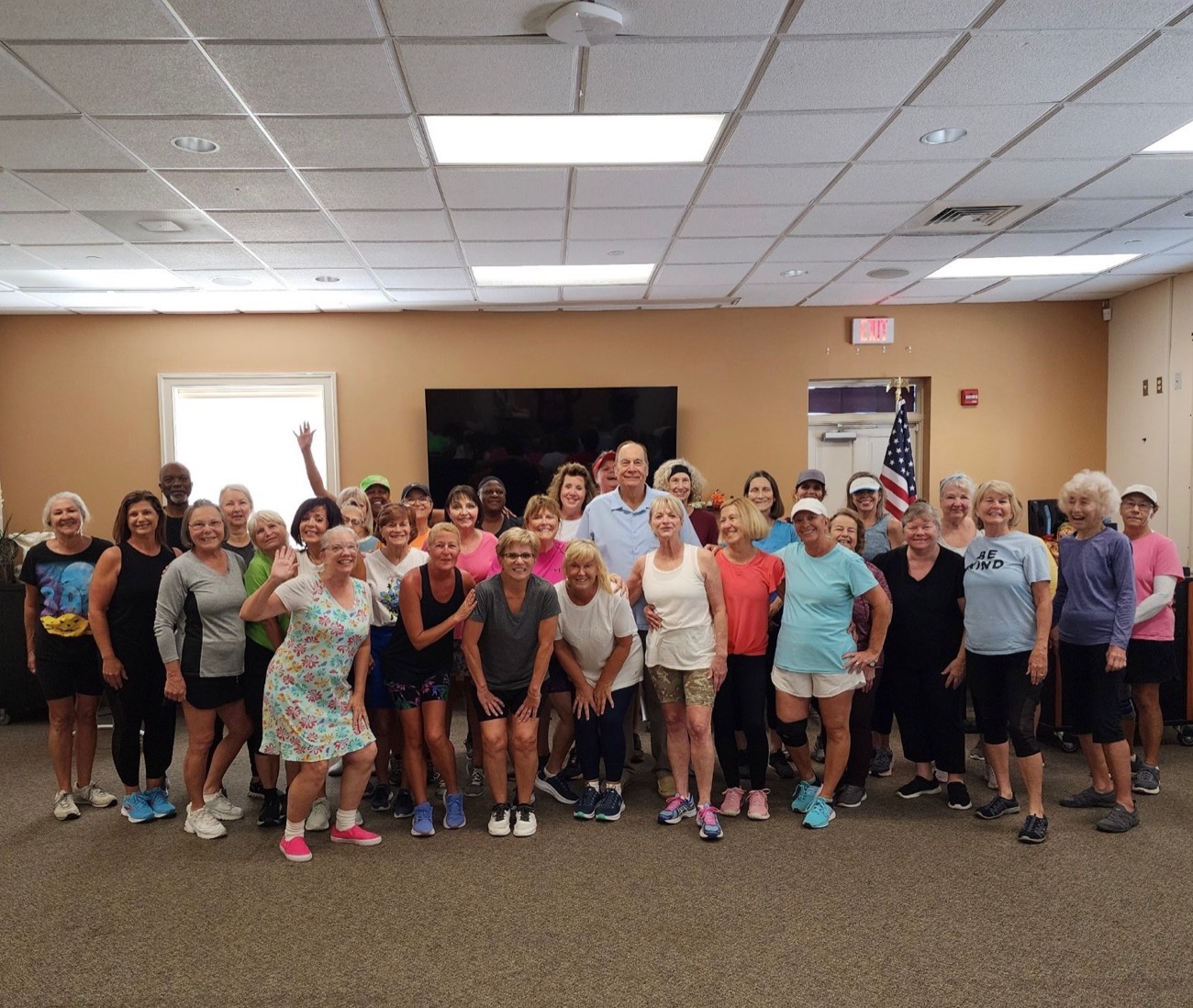 Mayor Jay Trapani in a group photo with a community exercise class